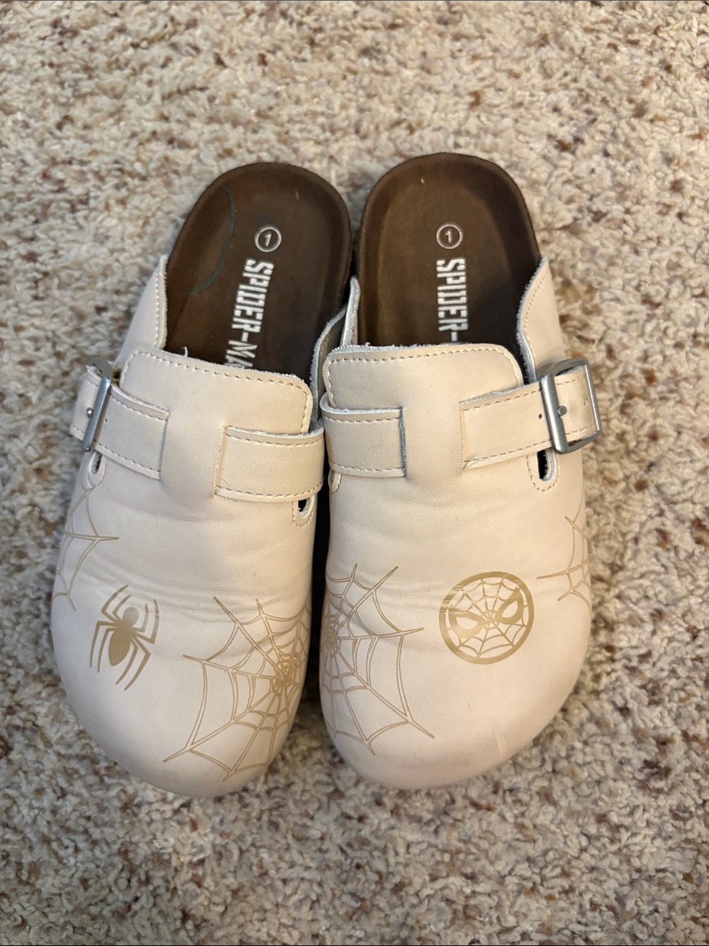 Skechers Kids Cream Clogs with Gold Spider Web Accents